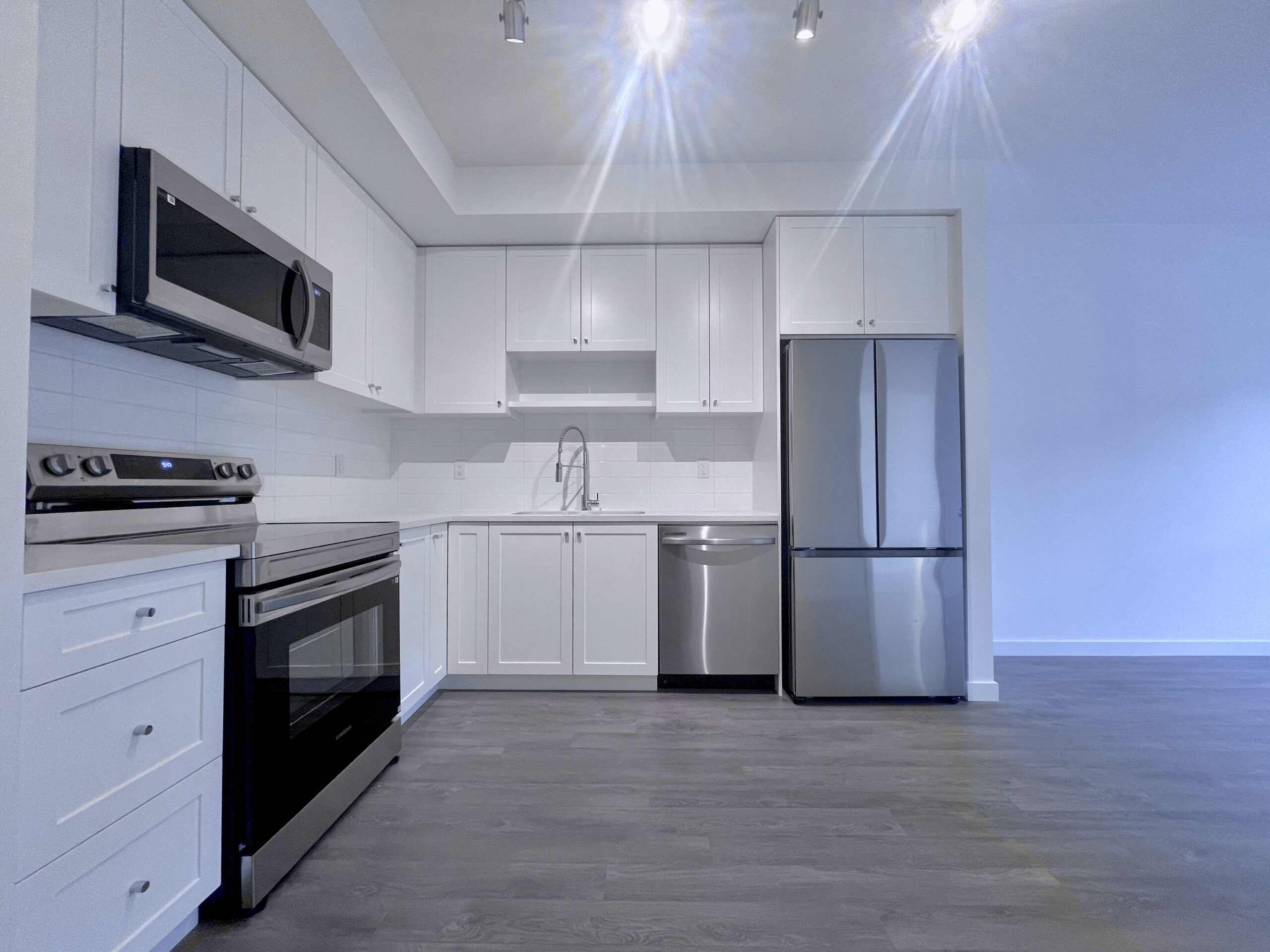 FLEETWOOD, SURREY – 2 BEDROOM, 2 BATHROOM & FLEX CONDO