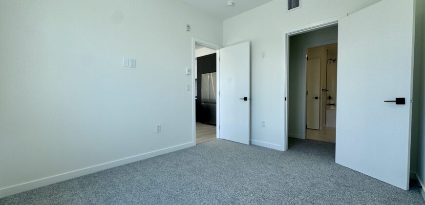SURREY – BRAND NEW TOP FLOOR 1 BEDROOM, 1 BATHROOM + DEN CONDO