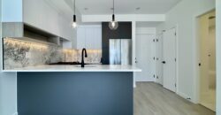 SURREY – Brand New 1 Bedroom + Den, 1 Bathroom Condo
