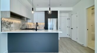 SURREY – Brand New 1 Bedroom + Den, 1 Bathroom Condo