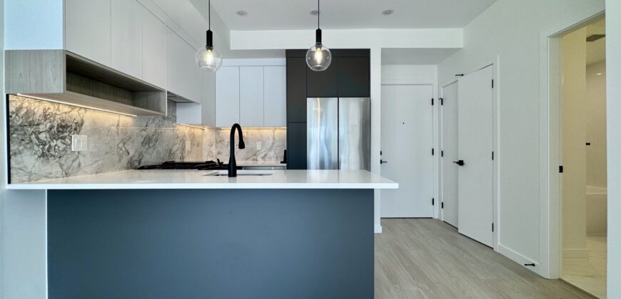 SURREY – Brand New 1 Bedroom + Den, 1 Bathroom Condo