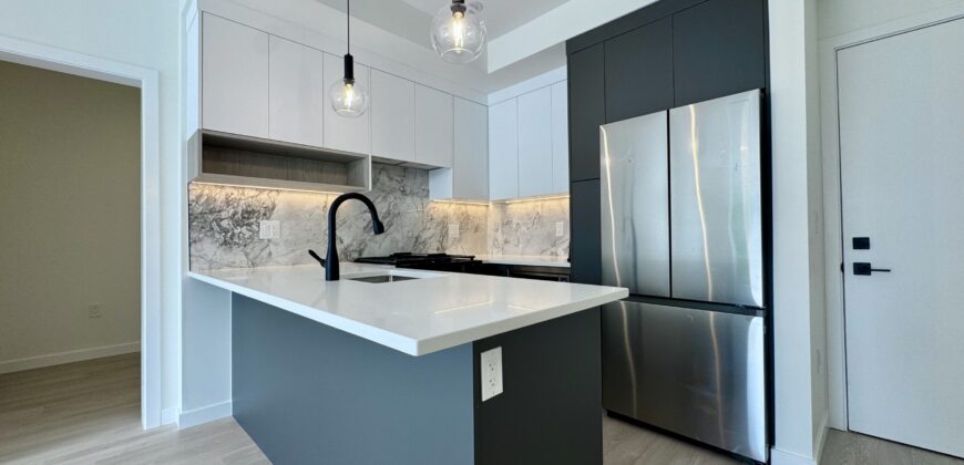 SURREY – Brand New 1 Bedroom + Den, 1 Bathroom Condo