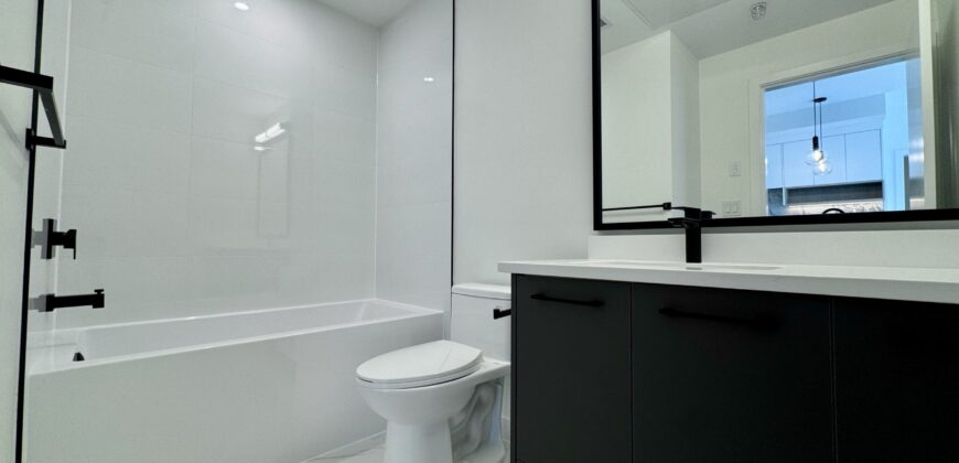 SURREY – Brand New 1 Bedroom + Den, 1 Bathroom Condo