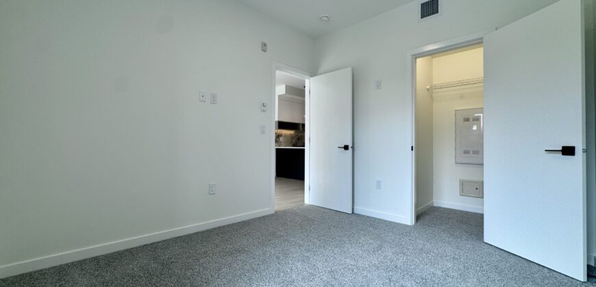 SURREY – Brand New 1 Bedroom + Den, 1 Bathroom Condo
