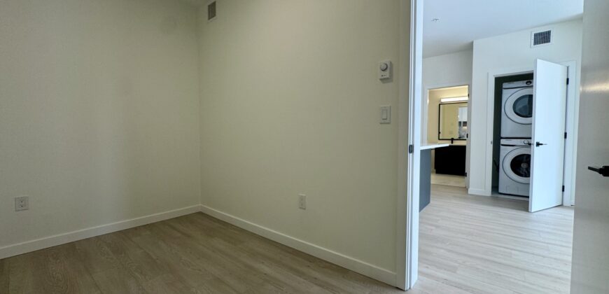 SURREY – Brand New 1 Bedroom + Den, 1 Bathroom Condo