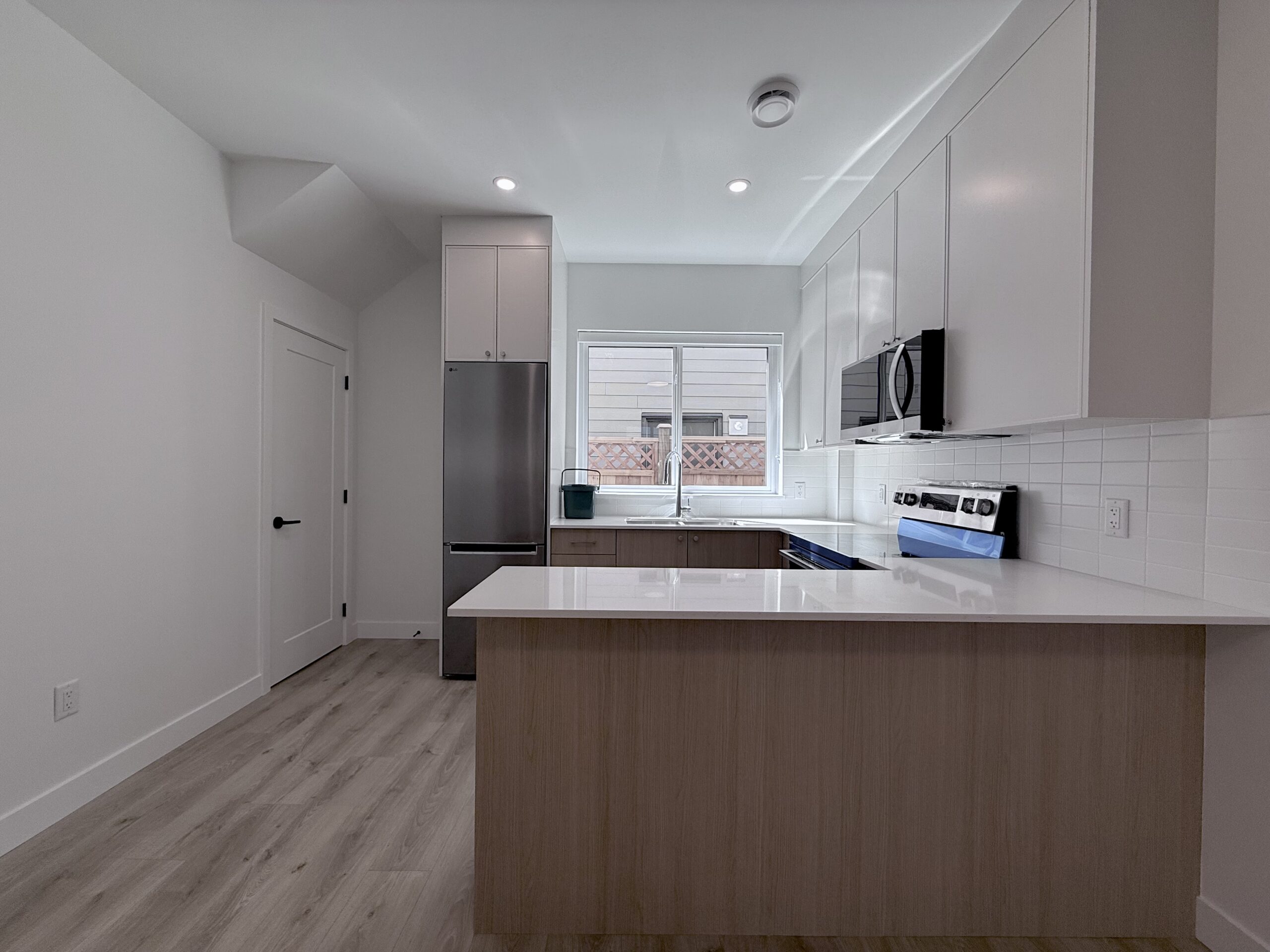 SURREY- 2 BEDROOM, 1.5 BATHROOM COACH HOME